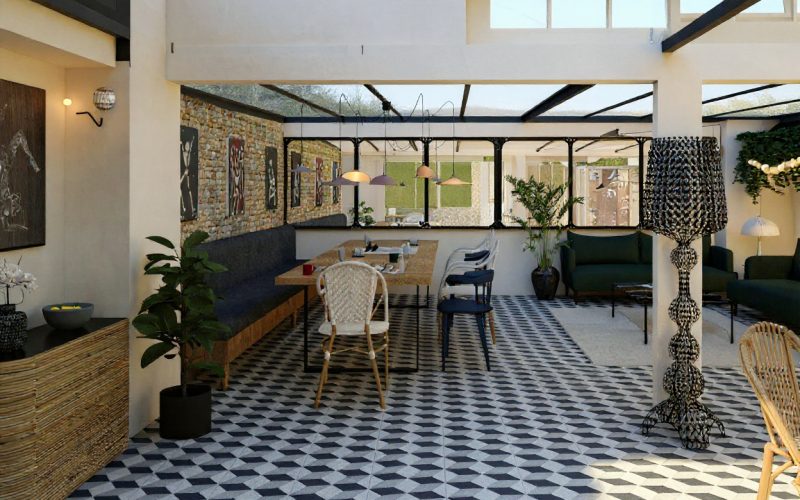lobby avec une belle verrière industrielle dans un hotel haussmannien
